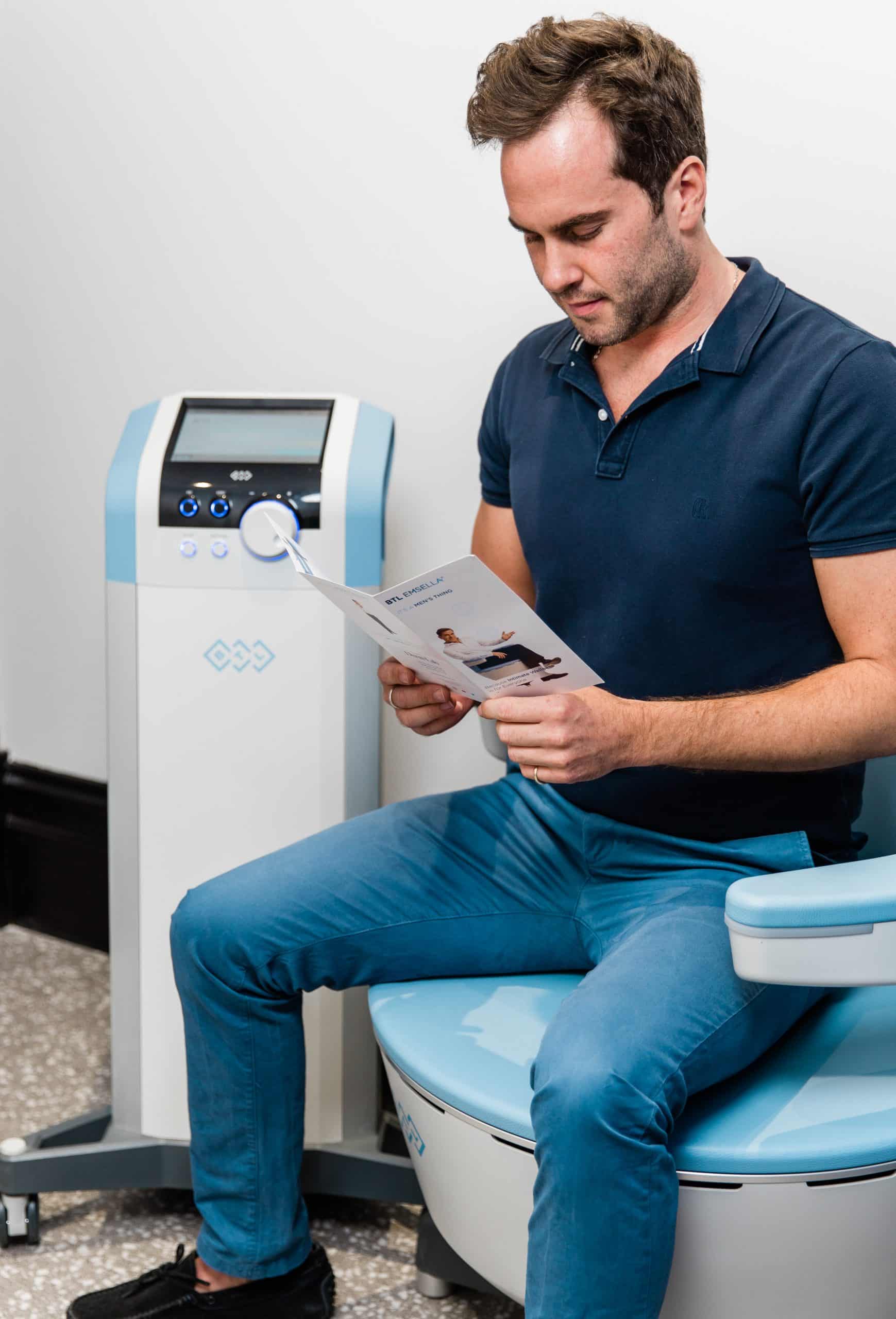 Male client receiving Emsella pelvic floor treatment at The Derm Lab Melbourne