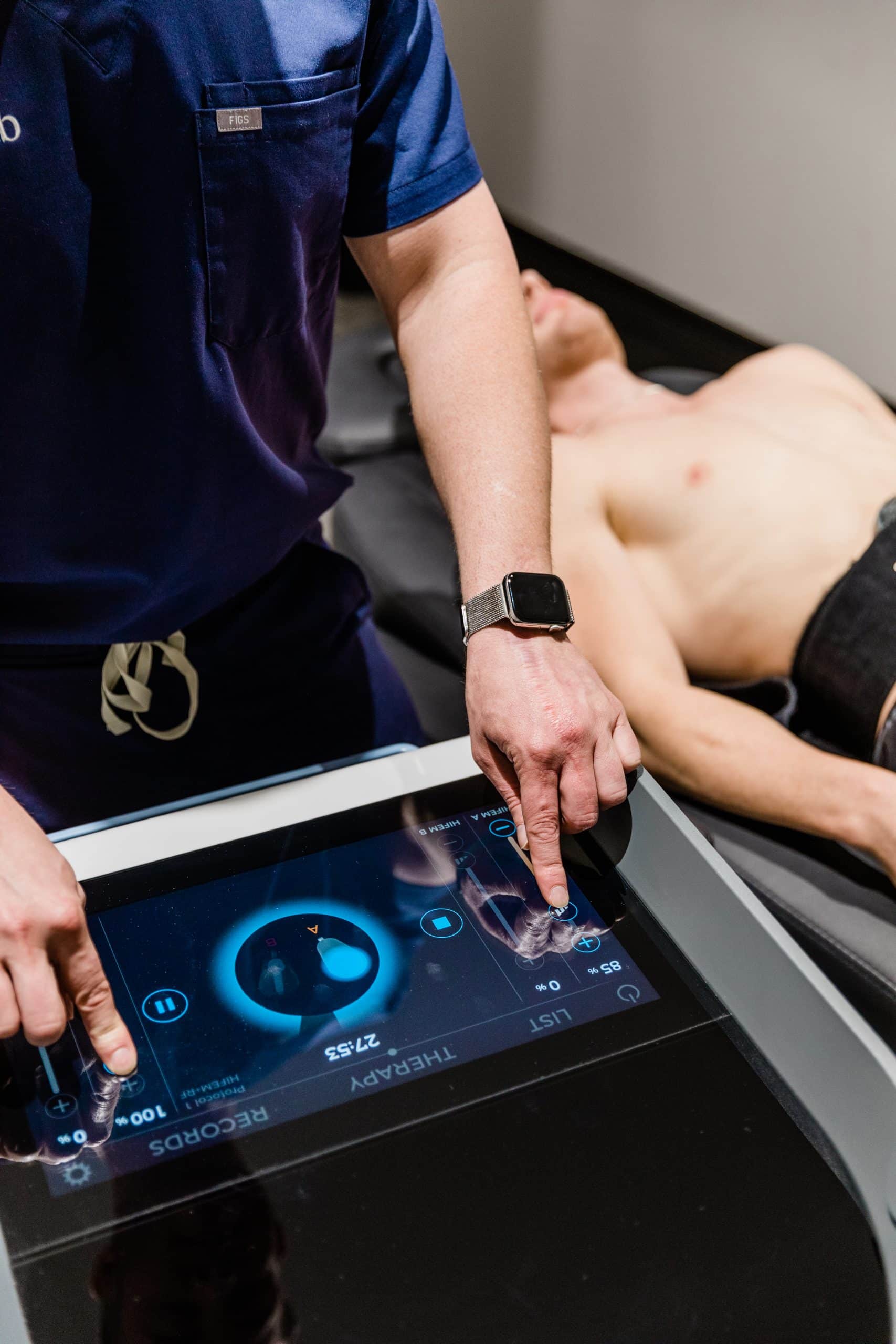 Clinician performing Emsculpt NEO body contouring treatment at The Derm Lab Melbourne