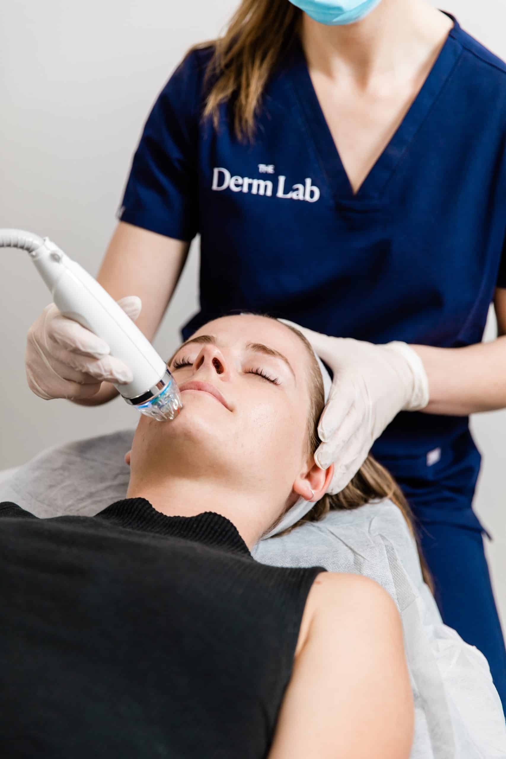 Clinician performing Secret RF microneedling treatment on a female client at The Derm Lab in Melbourne