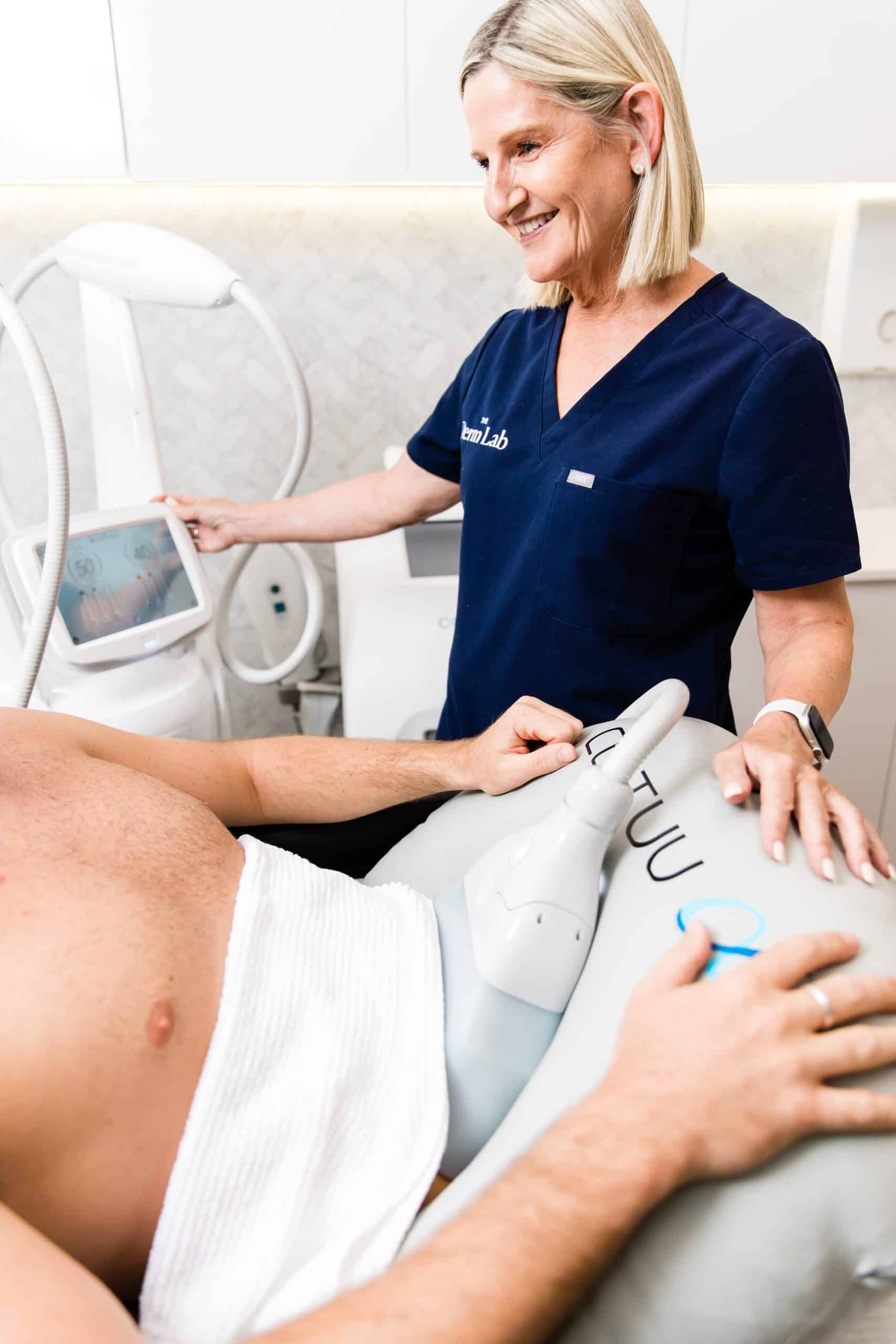 Clinician performing fat freezing with Cooltech or Clatuu Alpha device at The Derm Lab in Melbourne