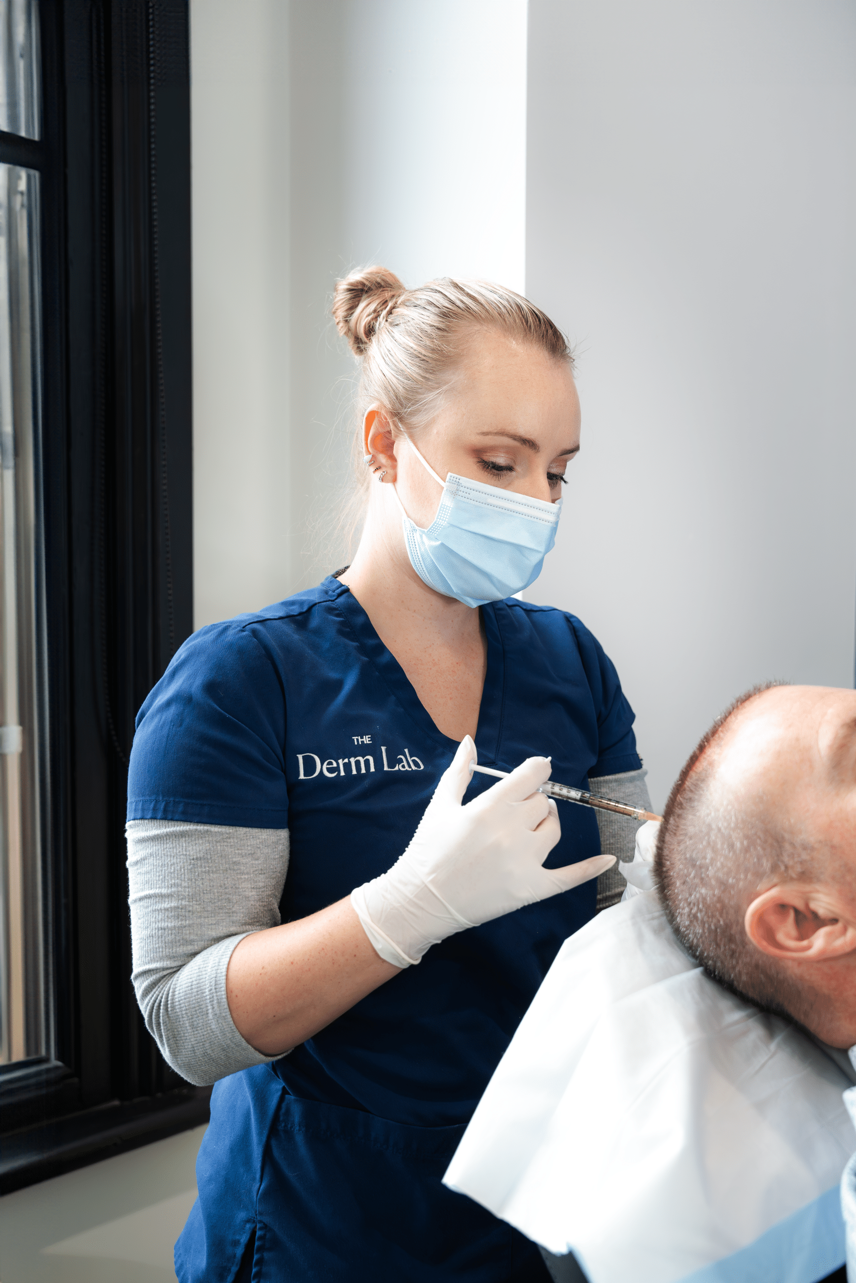 Clinician injecting PRP into a client’s scalp for hair restoration at The Derm Lab Melbourne